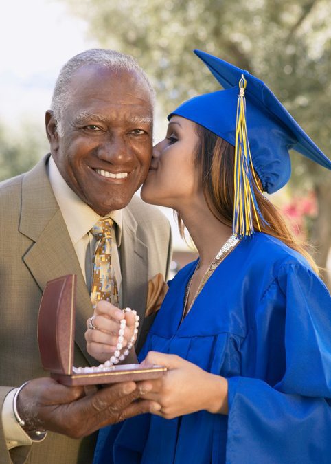 Norman Hege Jewelers | Rock Hill, SC | father presenting gift to graduate